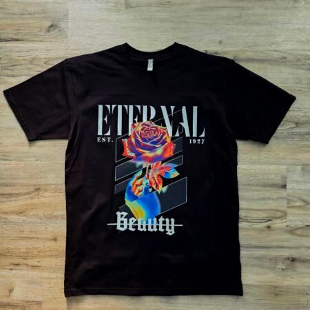 Eternal Beauty graphic t-shirt by SAVGE INK COLLECTIVE — bold distorted portrait design printed on black premium fabric