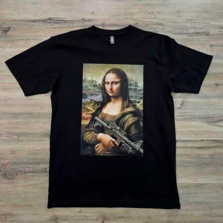 Mona Assault graphic t-shirt by SAVGE INK COLLECTIVE — reimagined Mona Lisa portrait design printed on black premium fabric