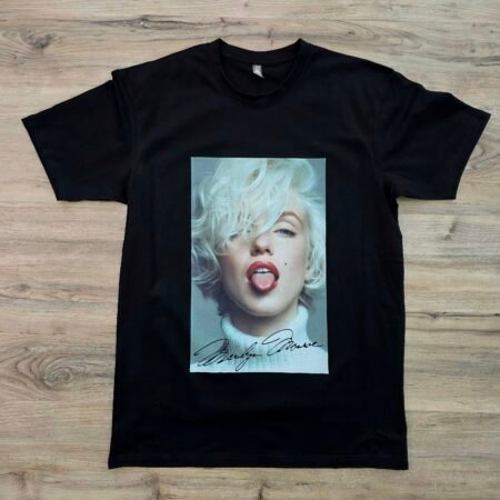 Tongue Flirt graphic t-shirt by SAVGE INK COLLECTIVE — bold provocative portrait design printed on black premium fabric
