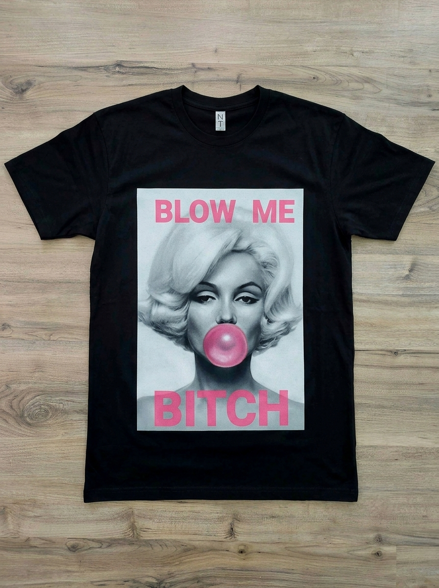 Blow Me graphic t-shirt by SAVGE INK COLLECTIVE — bold provocative portrait design printed on black premium fabric